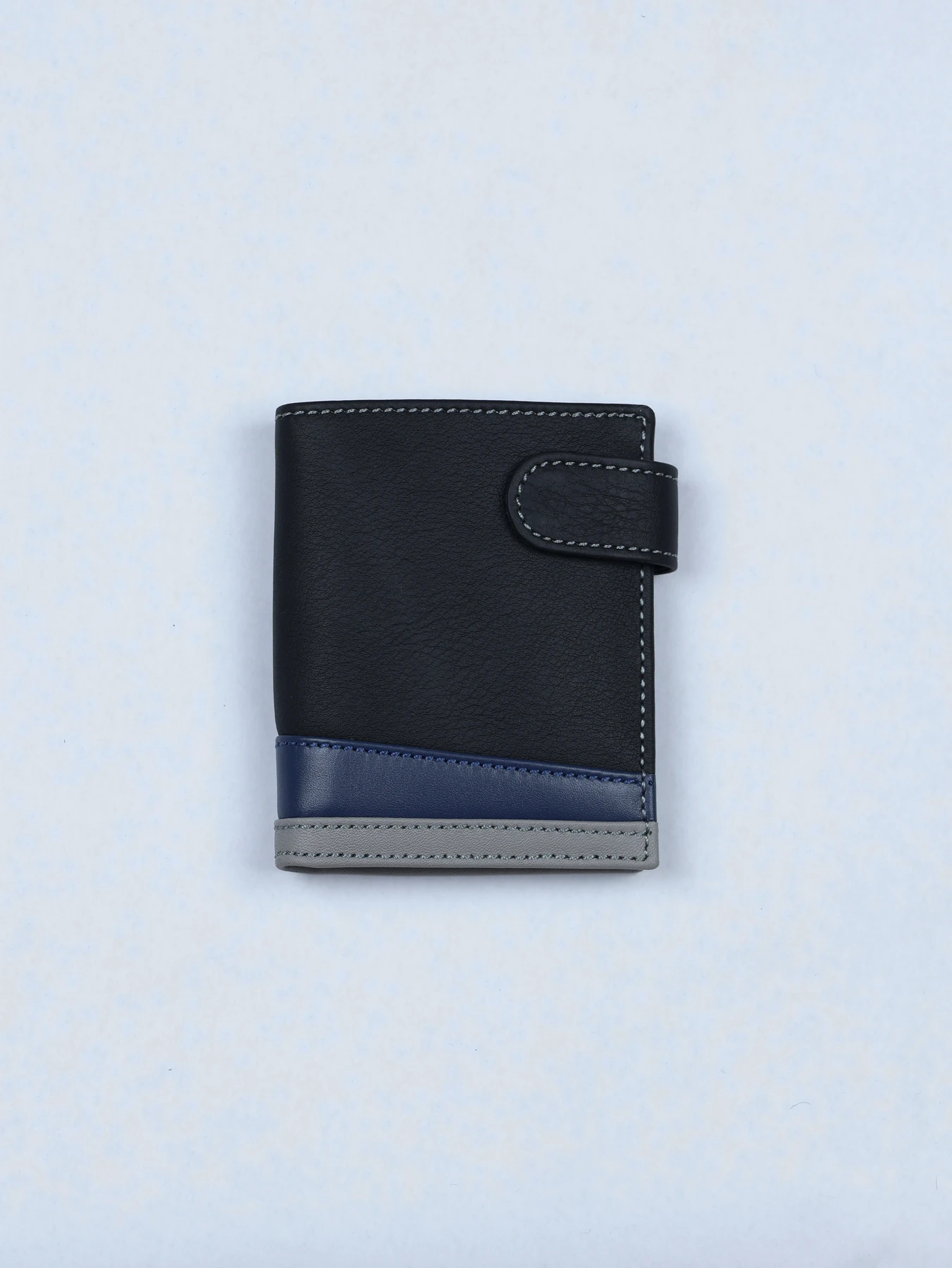 Cartera vertical de piel con bandas en contraste · Negro · imagen 1