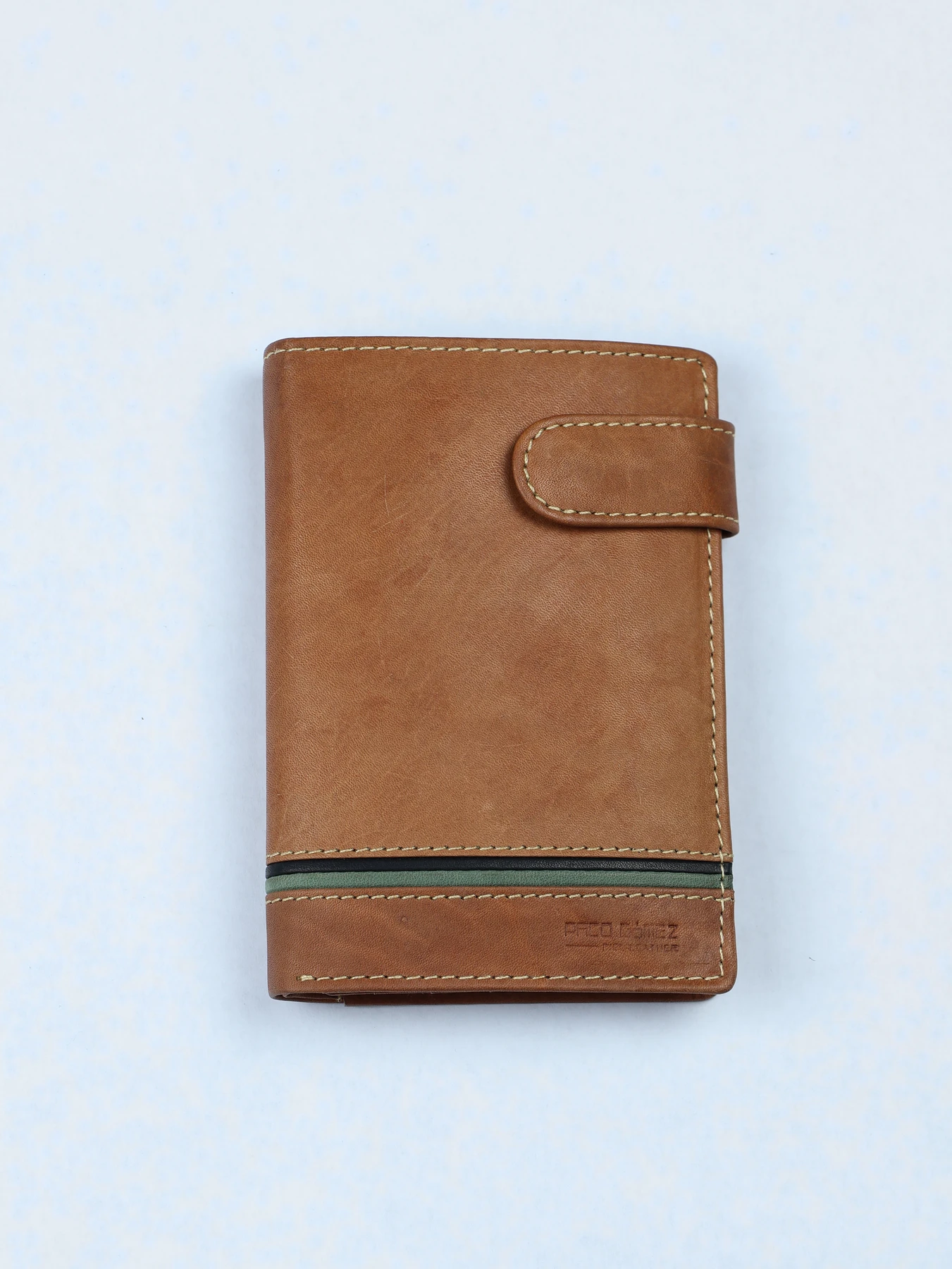 Cartera vertical de piel con banda en contraste · Cuero · imagen 1